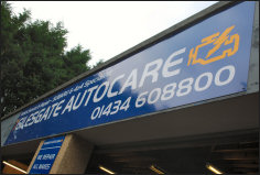 Look for the blue and gold Gilesgate Autocare sign